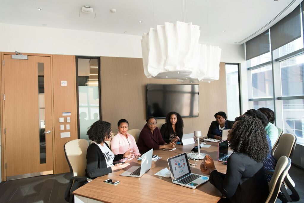 Colleagues discussing employment and business matters in a modern office